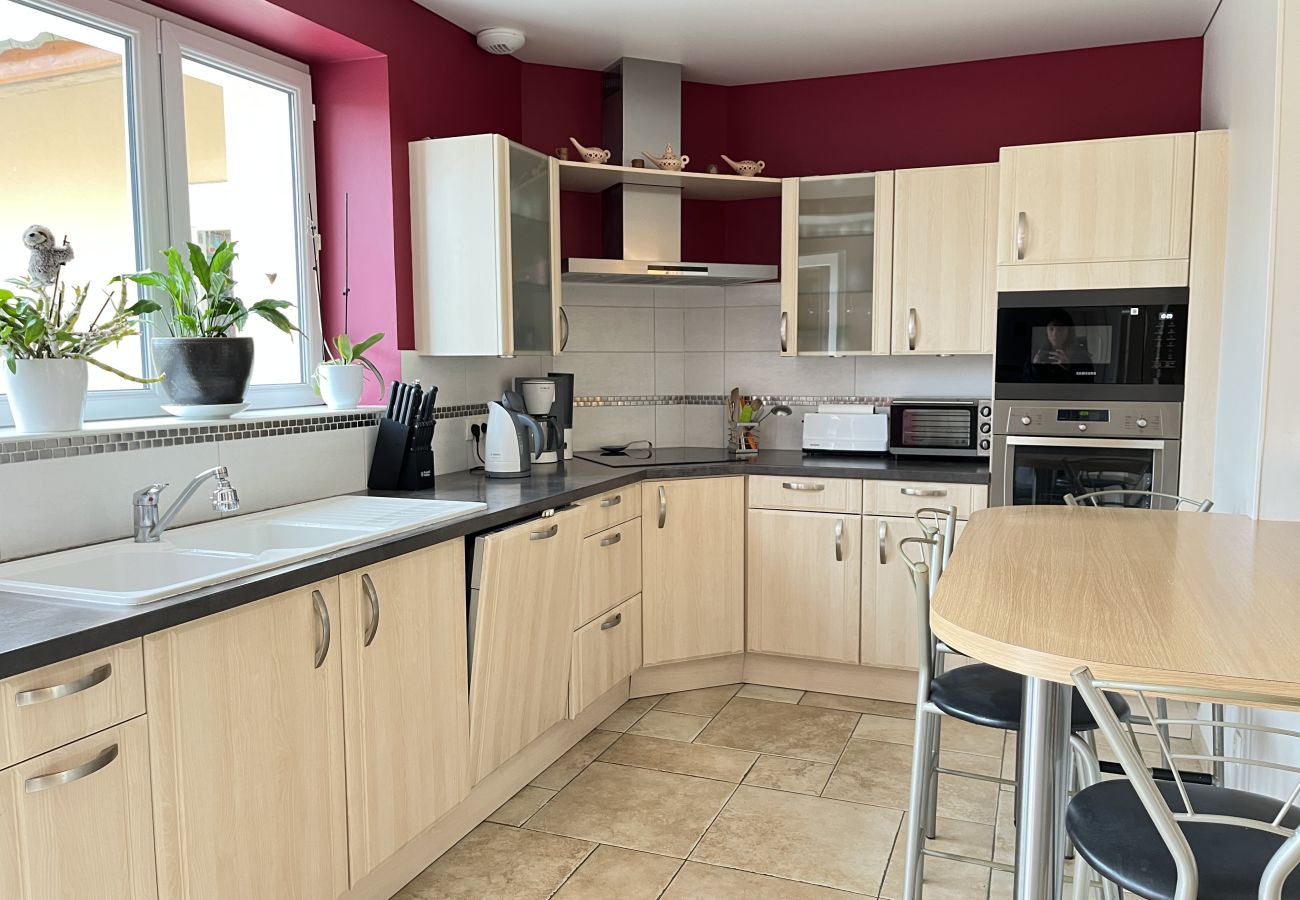 Kitchen opening onto the living room. 