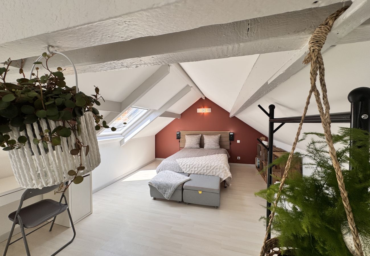 Cozy bedroom with desk.